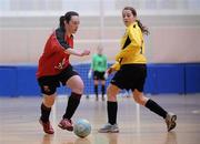 29 January 2011; Niamh Foley, UCC, in action against Ann-Marie Moffatt, NUI Maynooth. Womens Soccer Colleges Association of Ireland National Futsal Finals, University of Limerick, Limerick. Picture credit: Diarmuid Greene / SPORTSFILE