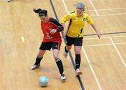 29 January 2011; Zoe Murphy, UCC, in action against Emma Coffey, NUI Maynooth. Womens Soccer Colleges Association of Ireland National Futsal Finals, University of Limerick, Limerick. Picture credit: Diarmuid Greene / SPORTSFILE
