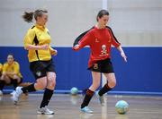29 January 2011; Olivia Lyons, UCC, in action against Megan Brick, NUI Maynooth. Group 1 Qualifier, Womens Soccer Colleges Association of Ireland National Futsal Finals, University of Limerick, Limerick. Picture credit: Diarmuid Greene / SPORTSFILE