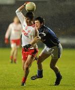 9 February 2011; Ciaran Gervin, Tyrone, in action against Stephen Jordan, Cavan. Barrett Sports Lighting Dr. McKenna Cup Semi-Final, Tyrone v Cavan, Brewster Park, Enniskillen, Co. Fermanagh. Picture credit: Oliver McVeigh / SPORTSFILE