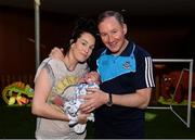 2 October 2016; Dublin manager Jim Gavin with Sarah Lynam and her 1 month old son Conall Curran, from Blanchardstown, during the Dublin team's visit to the Our Lady's Children's Hospital in Crumlin, Dublin.  Photo by Piaras Ó Mídheach/Sportsfile