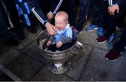 2 October 2016; Tomás O'Broin, 11 months old, from Inchicore, in the Sam Maguire cup during the Dublin team's visit to the Our Lady's Children's Hospital in Crumlin, Dublin.  Photo by Piaras Ó Mídheach/Sportsfile