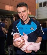 2 October 2016; Cormac Costello with Freya Dodson, age 9 days, from Portarlington Co Laois during the Dublin team's visit to the Our Lady's Children's Hospital in Crumlin, Dublin.  Photo by Piaras Ó Mídheach/Sportsfile