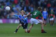 1 October 2016; Padraic Kehoe, O'Dwyers GAA, Balbriggan, Dublin, in action against Lucas Kenny, Crimlin NS, Castlebar, Mayo, during the INTO Cumann na mBunscol GAA Respect Exhibition Go Games at the GAA Football All-Ireland Senior Championship Final Replay match between Dublin and Mayo at Croke Park in Dublin. Photo by Ray McManus/Sportsfile