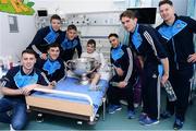 2 October 2016; Dublin players with Andrew Burke, 11, from Whitegate, Co Clare, and the Sam Maguire Cup during their visit to the Temple Street Children's Hospital in Dublin.  Photo by Sam Barnes/Sportsfile