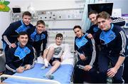 2 October 2016;  Dublin players with Andrew Burke, 11, from Whitegate, Co Clare, during their visit to the Temple Street Children's Hospital in Dublin.  Photo by Sam Barnes/Sportsfile