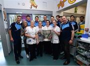 2 October 2016;  Dublin manager Jim Gavin and a selection of players with Temple Street Hospital staff during their visit to the Temple Street Children's Hospital in Dublin.  Photo by Sam Barnes/Sportsfile
