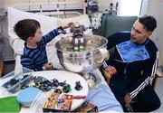 2 October 2016; Shane B. Carthy of Dublin and Sean Dixon, 4, from Drumcondra, Co Dublin with the Sam Maguire cup during their visit to the Temple Street Children's Hospital in Dublin.  Photo by Sam Barnes/Sportsfile