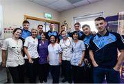 2 October 2016; Dublin players with members of staff during their visit to the Temple Street Children's Hospital in Dublin.  Photo by Sam Barnes/Sportsfile