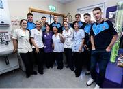 2 October 2016; Dublin players with members of staff during their visit to the Temple Street Children's Hospital in Dublin.  Photo by Sam Barnes/Sportsfile