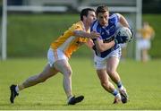 2 October 2016; Shane Carey of Scotstown in action against Pauric Boyle of Clontibret O'Neill's during the Monaghan County Senior Club Football Championship Final match between Clontibret O'Neill's and Scotstown at Castleblayney in Co Monaghan. Photo by Oliver McVeigh/Sportsfile