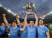 1 October 2016; Dublin players, from left, Bernard Brogan, Paddy Andrews, Diarmuid Connolly and Michael Darragh MacAuley celebrate with the Sam Maguire Cup following the GAA Football All-Ireland Senior Championship Final Replay match between Dublin and Mayo at Croke Park in Dublin. Photo by Stephen McCarthy/Sportsfile