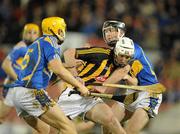12 February 2011; Michael Fennelly, Kilkenny, in action against David Young, left, and Conor O'Mahony, Tipperary. Allianz Hurling League, Division 1, Round 1, Tipperary v Kilkenny, Semple Stadium, Thurles, Co. Tipperary. Picture credit: Brendan Moran / SPORTSFILE