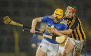12 February 2011; Pa Bourke, Tipperary, in action against John Mulhall, Kilkenny. Allianz Hurling League, Division 1, Round 1, Tipperary v Kilkenny, Semple Stadium, Thurles, Co. Tipperary. Picture credit: Brendan Moran / SPORTSFILE