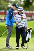 27 September 2016; Former Ireland and Munster rugby player Paul O’Connell of Europe in conversation with Actor Bill Murray of USA during the Celebrity Matches at The 2016 Ryder Cup Matches at the Hazeltine National Golf Club in Chaska, Minnesota, USA. Photo by Ramsey Cardy/Sportsfile