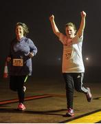 1 October 2016; Mary Smyth and Isobel Smyth during the Vhi A Lust for Life run series night run in Cork Airport. The run, in conjunction with the Irish Independent, saw runners, walkers and joggers of all levels lace up their running shoes, ignoring the late hour and complete the 5km night run along the Cork Airport runway. Funds raised go towards the Cork City Children’s Hospital Club, local athletics clubs in the area and A Lust for Life.  For further details, please see www.alustforlife.com.  Photo by Tomas Greally/Sportsfile