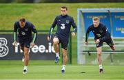 4 October 2016; Andy Meyler, left, Shane Coleman, and James McClean, right, of Republic of Ireland during squad training/press conference at the FAI National Training Centre in Abbotstown, Dublin. Photo by Sportsfile