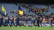 25 September 2016; The Longford and Antrim team walk behind the Artane Band before the TG4 Ladies Football All-Ireland Junior Football Championship Final match between Antrim and Longford at Croke Park in Dublin.  Photo by Brendan Moran/Sportsfile