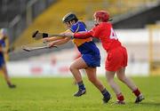 13 February 2011; Fiona O'Connell, O'Donovan Rossa, left, in action against Mary Buckley, Inniscarra. All-Ireland Senior Camogie Club Championship Semi-Final, Inniscarra, Cork, v O'Donovan Rossa, Antrim, Nowlan Park, Kilkenny. Picture credit: Ray McManus / SPORTSFILE
