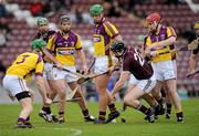 13 February 2011; Joesph Cooney, Galway, supported by team-mate Aongus Callanan, is surround by Wexford players, from left, Matthew O'Hanlon, Brendan Hobbs, Richie Kehoe and Paul Roche. Allianz Hurling League, Division 1, Round 1, Galway v Wexford, Pearse Stadium, Salthill, Galway. Picture credit: Barry Cregg / SPORTSFILE