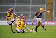 13 February 2011; Johnny Coen, Galway, in action against Paul Roche, centre, and Brendan Doyle, left, Wexford. Allianz Hurling League, Division 1, Round 1, Galway v Wexford, Pearse Stadium, Salthill, Galway. Picture credit: Barry Cregg / SPORTSFILE