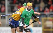 13 February 2011; David Breen, Limerick, in action against Diarmuid McMahon, Clare. Allianz Hurling League, Division 2, Round 1, Clare v Limerick, Cusack Park, Ennis, Co. Clare. Picture credit: Diarmuid Greene / SPORTSFILE