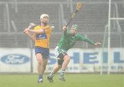 13 February 2011; Conor McGrath, Clare, in action against Stephen Walsh, Limerick. Allianz Hurling League, Division 2, Round 1, Clare v Limerick, Cusack Park, Ennis, Co. Clare. Picture credit: Diarmuid Greene / SPORTSFILE