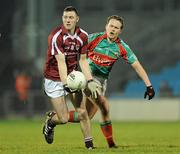 11 February 2011; Fiachra Desmhunhaigh, NUI Galway, in action against Andy Moran, Mayo,. FBD League Final, Mayo v NUI Galway, McHale Park, Castlebar, Co. Mayo. Picture credit: Barry Cregg / SPORTSFILE