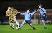 14 February 2011; Graham Rusk, UCD, with support from team-mate Paul Corry, right, in action against Andy Hunter, Lisburn Distillery. Setanta Sports Cup, Round 1 First Leg, UCD v Lisburn Distillery, Dalymount Park, Dublin. Picture credit: Barry Cregg / SPORTSFILE
