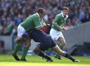22 September 2001; Ireland's Peter Clohessy is tackled by Scotland's Simon Taylor. Scotland v Ireland, Six Nations Rugby Championship, Murrayfield, Edinburgh, Scotland. Picture Credit; Brendan Moran / SPORTSFILE *EDI*
