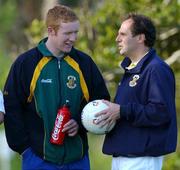 10 October 2001; Dermot McCabe, who did not train, in conversation with team doctor Dr Tom Foley, right, during an Irish squad training session in preparation for the Coca Cola International Rules Series against Australia. The Junction Oval, Melbourne, Australia. Aust2001. Picture credit; Ray McManus / SPORTSFILE *EDI*