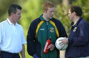 10 October 2001; Dermot McCabe, who did not train, in conversation with team doctor Dr Tom Foley, right, and Declan Gartland, the team's Masseur,  left, during an Irish squad training session in preparation for the Foster's International Rules Series against Australia. The Junction Oval, Melbourne, Australia. Aust2001. Picture credit; Ray McManus / SPORTSFILE *EDI*