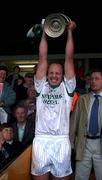 14 October 2001; Andy Comerford, captain of O'Loughlin Gaels, lifts the cup after victory over Graigue Ballycallan. O'Loughlin Gaels v Graigue Ballycallan, Kilkenny County hurling Final, Nowlan Park, Co. Kilkenny. Picture credit; Damien Eagers / SPORTSFILE *EDI*
