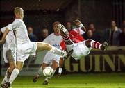19 October 2001; Mbabazi Livingstone, St Patrick's Athletic in action against Tony McCarthy, Shelbourne. St Patrick's Athletic incorporating St Francis v Shelbourne, Stadium of Light, Richmond Park, Soccer. Picture credit; David Maher / SPORTSFILE *EDI*