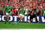 20 October 2001; Ireland's Ronan O'Gara, watched by team-mate Peter Clohessy, kicks a penalty just after coming on as a substitute for David Humphreys. Ireland v England, Six Nations Championship, Lansdowne Road, Dublin. Rugby. Picture credit; Matt Browne / SPORTSFILE