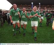 20 October 2001; Ireland players, from left, Trevor Brennan, Peter Clohessy and Keith Wood celebrate victory over England. Ireland v England, Six Nations Championship, Lansdowne Road, Dublin. Picture credit: Brendan Moran / SPORTSFILE