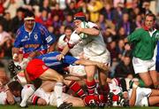 27 October 2001; Neil Doak, Ulster, is tackled by Christophe Dominici, Stade Francais. Stade Francais v Ulster, Heineken Cup,  Stade Jean Bouin, Paris, France. Rugby. Picture credit; Matt Browne / SPORTSFILE  *EDI*