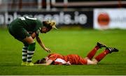 5 October 2016; Danielle Sheehy of Cork City WFC goes to the aid of Courtney Higgins of Shelbourne Ladies during the Continental Tyres Women's National League match between Shelbourne Ladies and Cork City WFC at Tolka Park in Drumcondra, Dublin. Photo by Seb Daly/Sportsfile