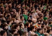 6 October 2016; Cian Kelly, age 7, from Athenry, Co. Galway, watches on during the FIFA World Cup Group D Qualifier match between Republic of Ireland and Georgia at Aviva Stadium, Lansdowne Road in Dublin. Photo by Seb Daly/Sportsfile