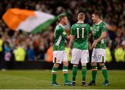 6 October 2016; James McCarthy, left, James McClean, centre, and Stephen Ward of Republic of Ireland congratulate each other following their team's victory during the FIFA World Cup Group D Qualifier match between Republic of Ireland and Georgia at Aviva Stadium, Lansdowne Road in Dublin. Photo by Seb Daly/Sportsfile