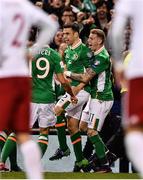 6 October 2016; Seamus Coleman of Republic of Ireland celebrates with team-mates Jonathan Walters and James McClean after scoring their side's only goal during the FIFA World Cup Group D Qualifier match between Republic of Ireland and Georgia at Aviva Stadium, Lansdowne Road in Dublin. Photo by Brendan Moran/Sportsfile