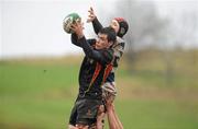 16 February 2011; Eoin McCabe, Ardscoil Ris, wins possession for his side in the lineout ahead of Aidan O'Sullivan, Rockwell College. Avonmore Milk Munster Schools Senior Cup, Ardscoil Ris v Rockwell College, Clanwilliam RFC, Tipperary Town, Tipperary. Picture credit: Diarmuid Greene / SPORTSFILE
