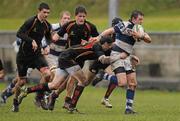 16 February 2011; Brian Haugh, Rockwell College, is tackled by Andrew O'Byrne, Ardscoil Ris. Avonmore Milk Munster Schools Senior Cup, Ardscoil Ris v Rockwell College, Clanwilliam RFC, Tipperary Town, Tipperary. Picture credit: Diarmuid Greene / SPORTSFILE