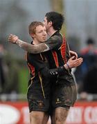 16 February 2011; Conor McLoughlin, left, and Jamie McGarry, Ardscoil Ris, embrace after defeat to Rockwell College. Avonmore Milk Munster Schools Senior Cup, Ardscoil Ris v Rockwell College, Clanwilliam RFC, Tipperary Town, Tipperary. Picture credit: Diarmuid Greene / SPORTSFILE