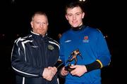 16 February 2011; CEO of the Colleges League Padraig Carney presents James Scallan, right, IT Carlow, with the man of the match award. CUFL Premier Division Final, IT Carlow v ITT Dublin, Home Farm FC, Whitehall, Dublin. Picture credit: Barry Cregg / SPORTSFILE