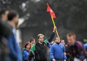 17 February 2011; The linesman uses a corner flag during the match. Ulster Bank Sigerson Cup First Round, DIT v UL, St Anne's Park, Raheny, Dublin. Picture credit: Brian Lawless / SPORTSFILE