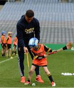 8 October 2016; Wexford hurler Lee Chin with Jesse Sullivan, age 7, from Adamstown GAA in Wexford, as Croke Park today played host to some of Ireland’s most talented hurlers, along with over 500 children, who lined-out to learn tips and skills from their hurling heroes as part of Centra’s Live Well hurling initiative. The participating children, who experienced a once in a lifetime opportunity, came from 12 lucky GAA clubs who each claimed their very special spot by winning a Live Well hurling challenge during the summer. Croke Park, Dublin. Photo by Piaras Ó Mídheach/Sportsfile