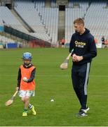 8 October 2016; Waterford hurler Maurice Shanahan coaching Séan Wilson, age 8, from O'Toole's GAA in Dublin as Croke Park today played host to some of Ireland’s most talented hurlers, along with over 500 children, who lined-out to learn tips and skills from their hurling heroes as part of Centra’s Live Well hurling initiative. The participating children, who experienced a once in a lifetime opportunity, came from 12 lucky GAA clubs who each claimed their very special spot by winning a Live Well hurling challenge during the summer. Croke Park, Dublin. Photo by Piaras Ó Mídheach/Sportsfile