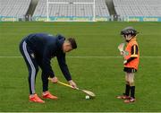 8 October 2016; Wexford hurler Lee Chin with Paddy Cash, age 8, from Adamstown GAA in Wexford, as Croke Park today played host to some of Ireland’s most talented hurlers, along with over 500 children, who lined-out to learn tips and skills from their hurling heroes as part of Centra’s Live Well hurling initiative. The participating children, who experienced a once in a lifetime opportunity, came from 12 lucky GAA clubs who each claimed their very special spot by winning a Live Well hurling challenge during the summer. Croke Park, Dublin. Photo by Piaras Ó Mídheach/Sportsfile