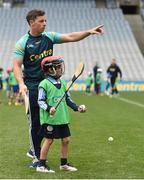 8 October 2016; Cork hurler Anthony Nash teaches Moillí Goff, age 9, from the Gailltír Camogie Club, Co Waterford, at Croke Park today which played host to some of Ireland’s most talented hurlers, along with over 500 children, who lined-out to learn tips and skills from their hurling heroes as part of Centra’s Live Well hurling initiative. The participating children, who experienced a once in a lifetime opportunity, came from 12 lucky GAA clubs who each claimed their very special spot by winning a Live Well hurling challenge during the summer. Croke Park, Dublin. Photo by Cody Glenn/Sportsfile